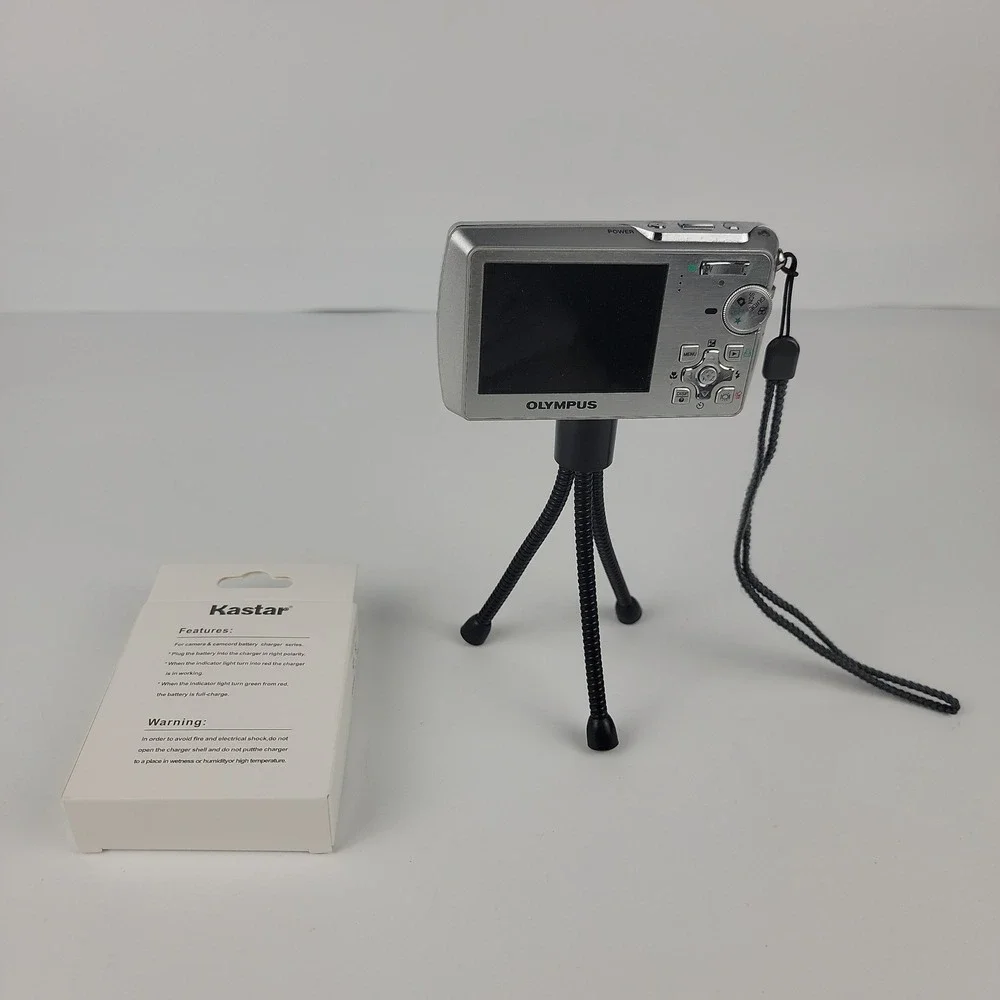 Olympus Stylus 760 All-Weather 7.1MP Digital Camera Bundle Tripod Charger Black